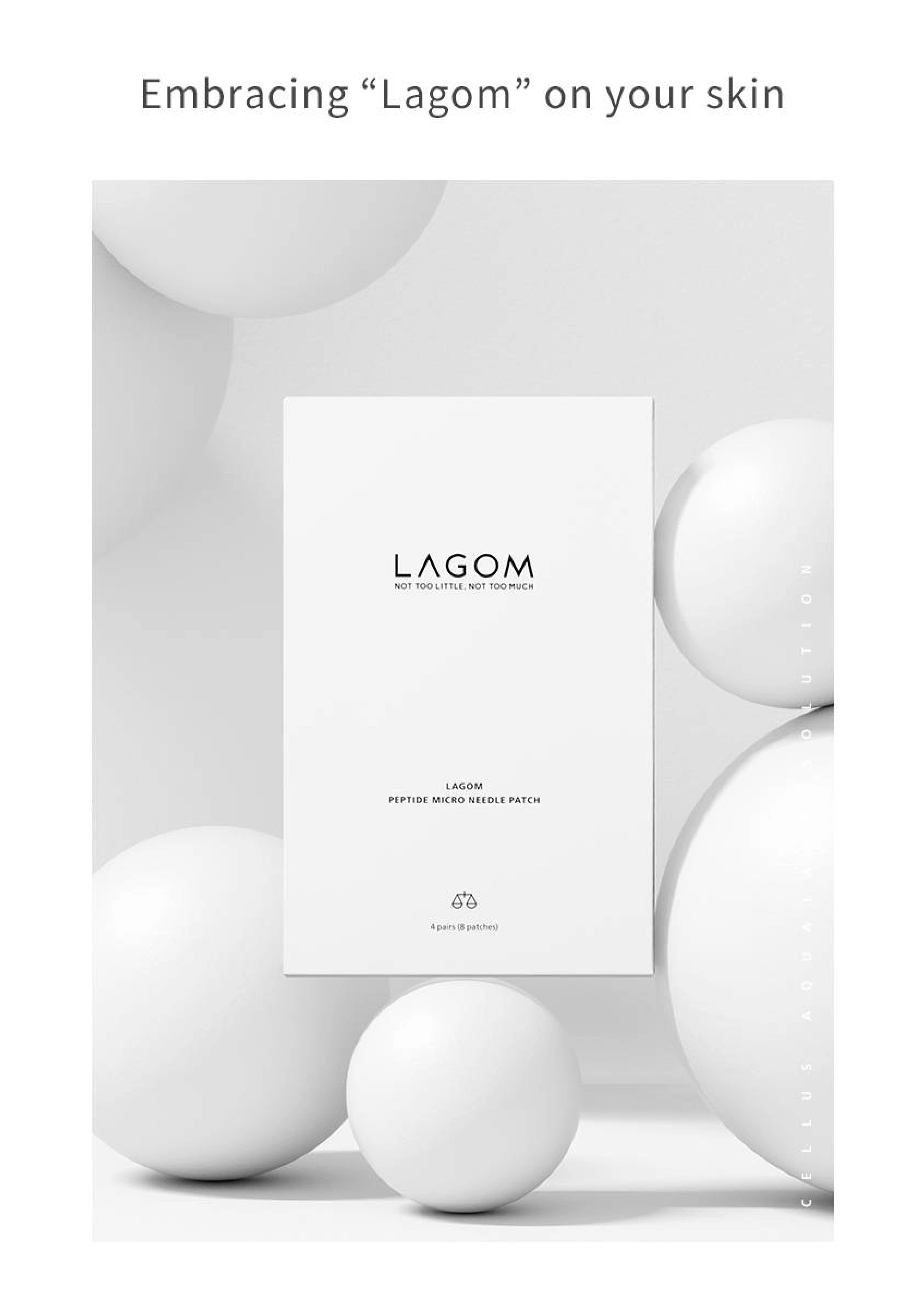 Lagom product packaging with white spheres on a light gray background